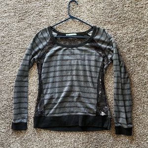 Long sleeve sweater with lace inserts on back and side panels